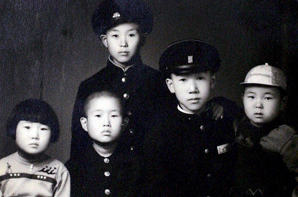 Ban (second from right, above) was born in Japanese-occupied Korea in 1944. His father ran a warehouse business until it went bankrupt.
