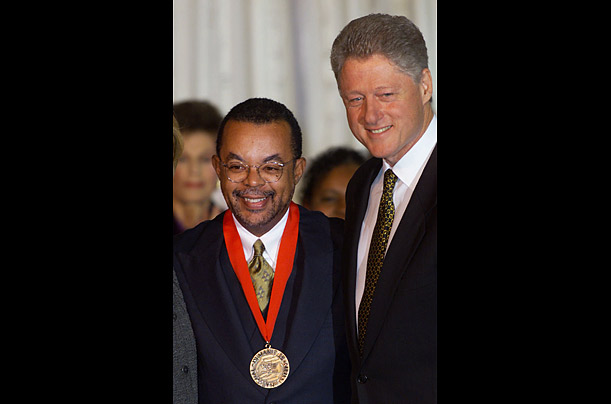 Throughout his career, Gates has received nearly 50 honorary degrees and numerous awards. In this photo he poses with President Clinton after receiving a National Humanities Medal in 1998.

