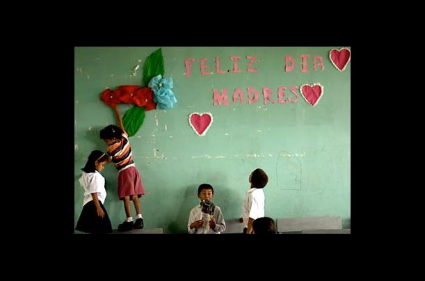 A group of children prepare for Mother's Day at their school in the community of Los Pinos, in Tegucigalpa, Honduras.