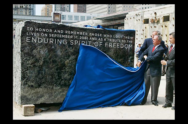 new york city mayor michael bloomberg unveils a cornerstone's inscription at the world trade center site