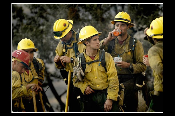 Members of an elite Hot Shot hand crew take a break before going back into the Crown Fire near Acton, California