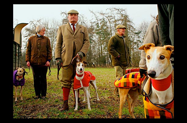 Owners and their dogs at the Swaffham Coursing Club Meeting in England