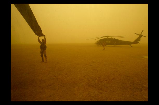 A U.S. Army Blackhawk helicopter carrying media and staff is grounded by a sandstorm south of Irbil, Iraq