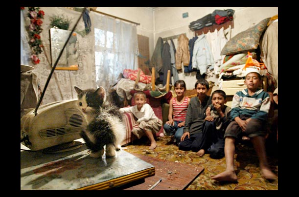 An Uzbek family in Andijan in their humble living quarters. Poverty was a reason why protesters turned out in mass for a demonstration