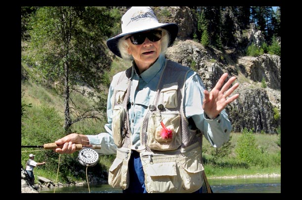 Supreme Court Justice Sandra Day O'Connor fly fishing along the St. Joe River near Avery, ID
