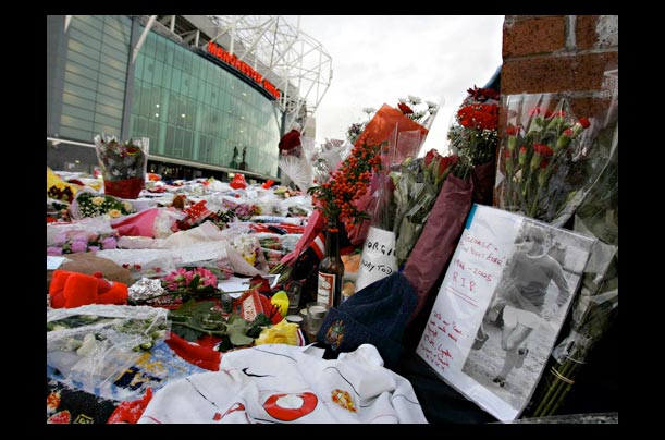 A shrine for former Manchester United and Northern Ireland soccer legend George Best outside Old Trafford football ground in Manchester, England