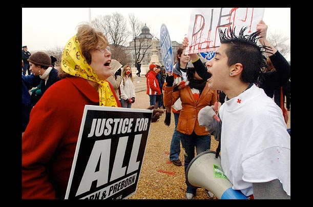 Pro and anti-abortion activists face off the near the Supreme Court in Washington, D.C.