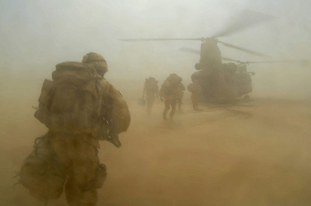 British soldiers move toward a Royal Air Force, Chinook helicopter in Helmand Province, Afghanistan, during a new operation.