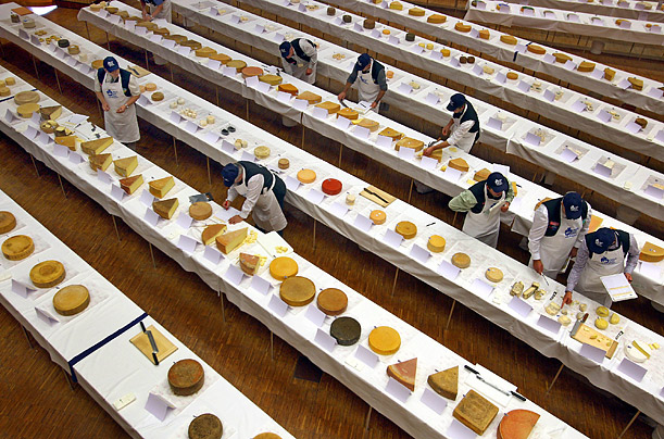 Judges rate Alpine cheese in Oberstdorf, Germany. Jury members at the 5th Alpine Cheese Olympics rated over 700 kinds of Alpine cheese from all over the world. 
