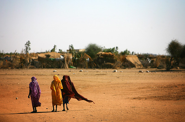 Refugees from Darfur walk in a camp run by the NGO 'Eastern Chad' in Gaga. More than 17,000 Darfurians live in the camp.
