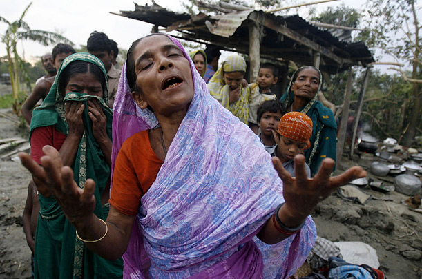 Niru Begum's 80-year-old mother was killed when their house collapsed during the cyclone, in Bakerganj, Bangladesh.