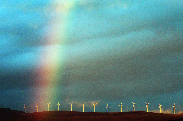 A rainbow hangs over electricity-producing wind turbines near the Spanish Basque town of Durango.