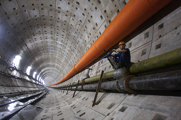 A laborer works at the construction site of the Wuhan-Yangtze River Tunnel in Hubei, China. 
