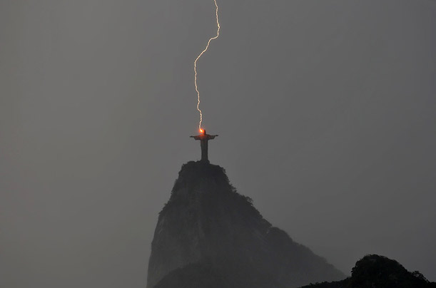 Rio de Janeiro's famed Christ the Redeemer statue is hit by lightening in a thunderstorm.