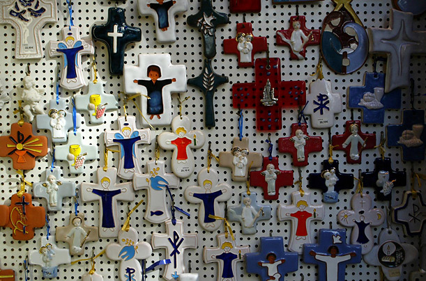 A religious shop sells souvenirs on 150th anniversary of the first apparition of Our Lady of Lourdes to Bernadette Soubirous, in Lourdes, France.

