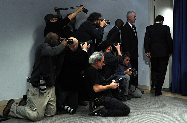 New York Governor Eliot Spitzer leaves after a news conference held after the [ITALIC 