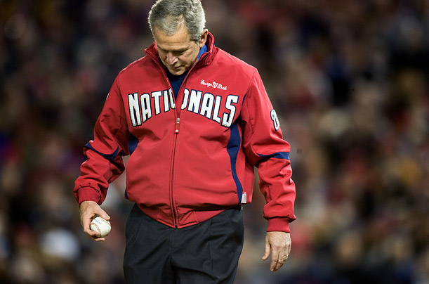 U.S. President George W. Bush walks on the field to throw out the first pitch during the Washington Nationals opening home game against the Atlanta Braves at Nationals Park in Washington, DC.