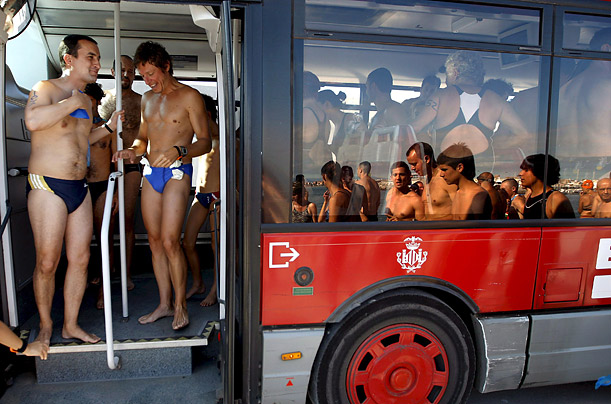 Partcipants of the Crossing to the Port of Valencia arrive via bus at the event in eastern Spain.