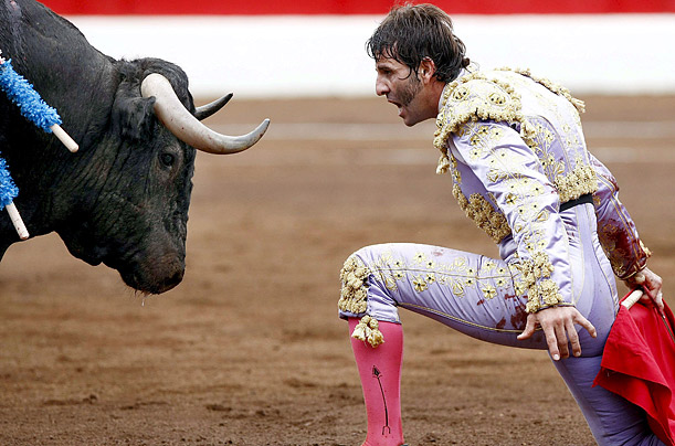 Bullfighter Juan Jose Padilla gets up close and personal with a bull in Santander, Spain.
