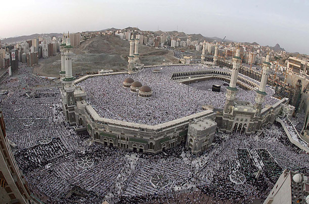 Muslim worshippers circle the Kaaba at Mecca's Grand Mosque during Ramadan.

