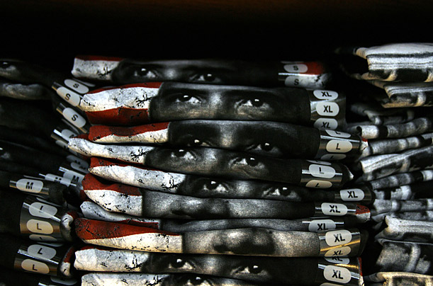 Stacks of Barack Obama t-shirts sit on a shelf at the Official Inaugural Collectibles store in Washington
