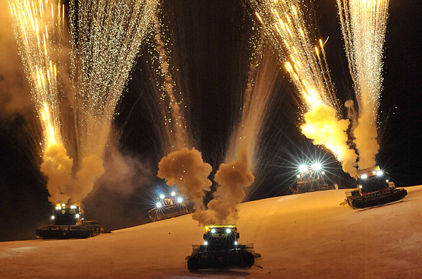 Fireworks are launched from snow bulldozers during the 'Villars Night Show' in Villars, Switzerland.

