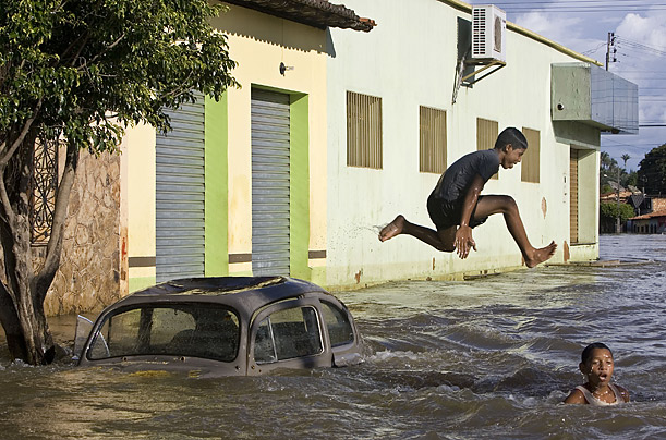 Flooding in Brazil has forced nearly 300,000 people from their homes, but for these kids, it was an opportunity to play.