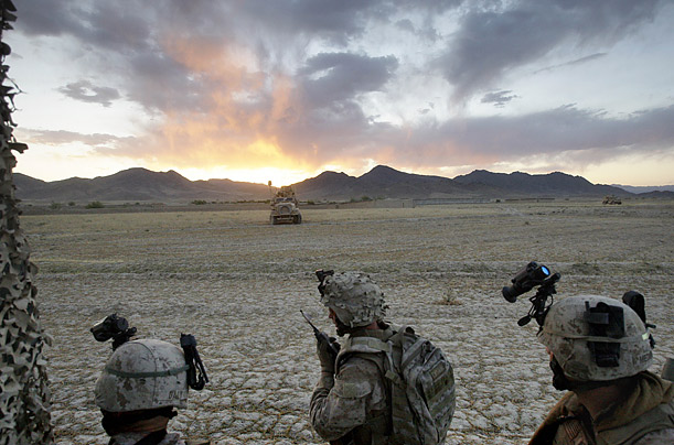 U.S Marines dismount their vehicles during a battle with Taliban fighters in Afghanistan's Helmand province.