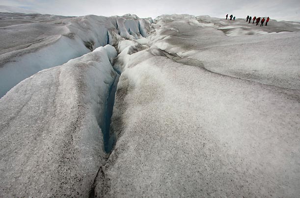 A group of hikers walk across the Greenland ice cap near the town of Kulusuk.
