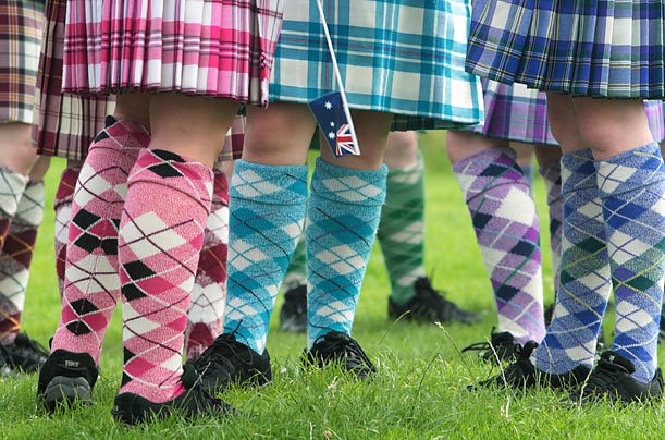 Highland dancers get ready to take part in a parade that marks the start of the Edinburgh Festival.