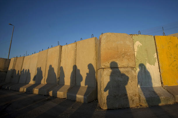 Lines
Shadows of Palestinian women fall on a blast wall at a checkpoint outside the West Bank city of Ramallah.