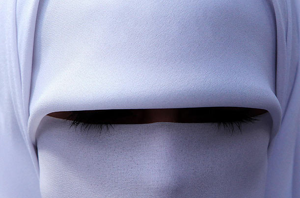 Minimalist
A veiled Jordanian woman appears in Amman, Jordan.