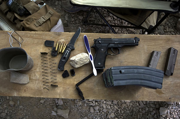 Essentials
A US Marine's personal effects sit on a bench at a base in Farah Province, southern Afghanistan.