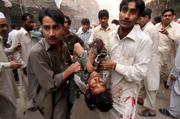 Destruction
An injured person is rushed to a hospital after an explosion in Peshawar, Pakistan. The blast claimed the lives of