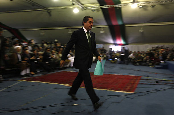Concession
Afghanistan's presidential challenger Abdullah Abdullah walks towards podium to address media in Kabul