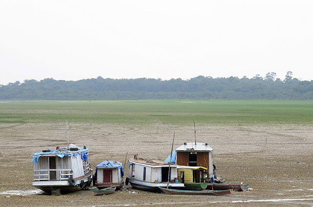 Riverboats sit on the bottom of a lake that forms part of the Amazon River system, on the outskirts of Manaus, Brazil. After a near-record rainy season in the first half of the