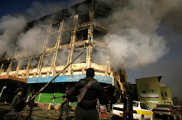 Smoking Husk
Afghan security forces gather at the scene of a brazen attack by the Taliban in central Kabul.