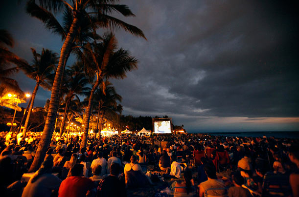 On the Island
A large crowd gathers on the beach to see the premiere of the final season of Lost on Waikiki beach in Honolulu.
