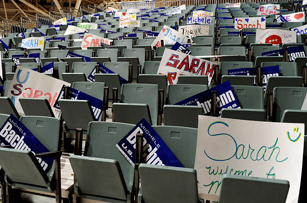 Campaign signs are placed on empty seats prior to a rally in Minneapolis for Republican Representative, Michele Bachmann and featuring Sarah Palin.
