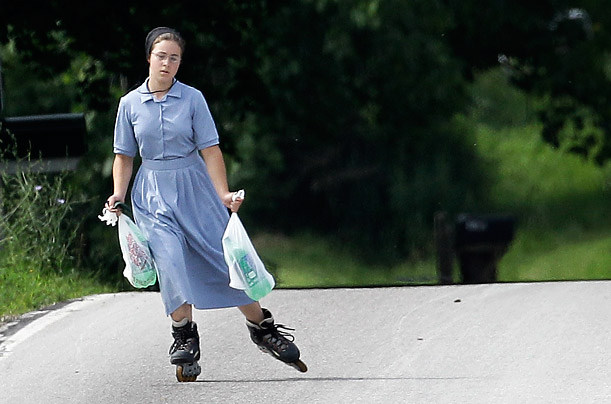 Self Propelled

An Amish girl roller blades with her groceries along a road in Middlefield, Ohio.