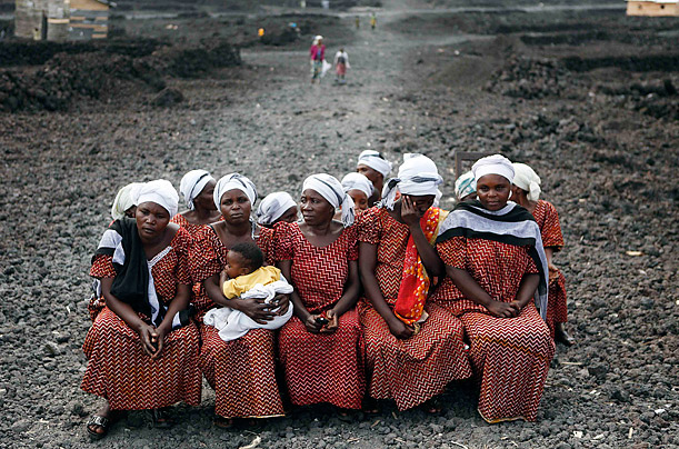Solidarity

Women from a church choir sit on benches in Goma, Congo atop lava flow from a 2002 eruption.