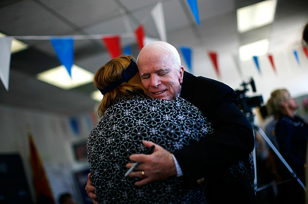 He's a Hugger

Senator John McCain hugs supporter Kathi Korth during a visit to a campaign office in Tucson, Arizona, one day before Arizona's primary election.