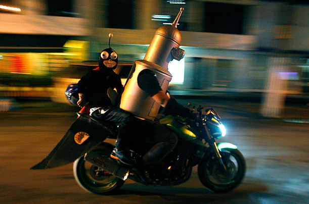 Ride It Like Bender

A couple dressed as characters from the television series <i>Futurama</i> participate in the annual 