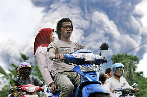 Escape

Local residents evacute a danger zone as the Merapi volcano releases ash clouds near the village of Balerante in Indonesia.