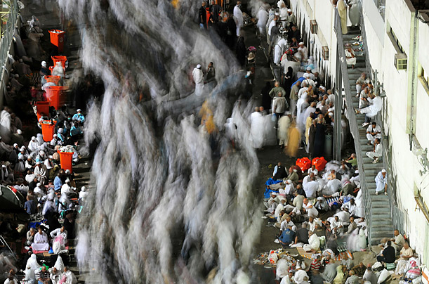 Muslim pilgrims leave from Mina valley, near the holy city of Mecca, after casting pebbles at pillars as part of the hajj ritual of 'Jamarat', the symbolic stoning of Satan.