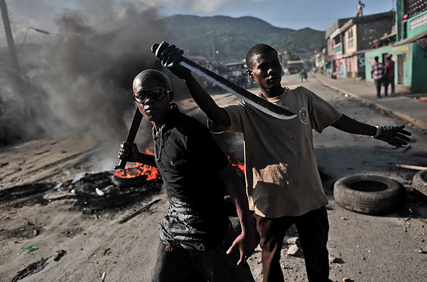 Haitians protest in the city of Cap-Haitien, accusing Nepalese of bringing cholera to Haiti. Protesters gathered, yelling anti-U.N. slogans and hurling stones at U.N. peacekeepers, while