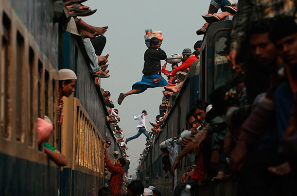 Bangladeshi Muslims try to return home after attending one of the world's largest religious gatherings, the three-day Islamic Congregation on the banks of the River Turag in Tongi, near