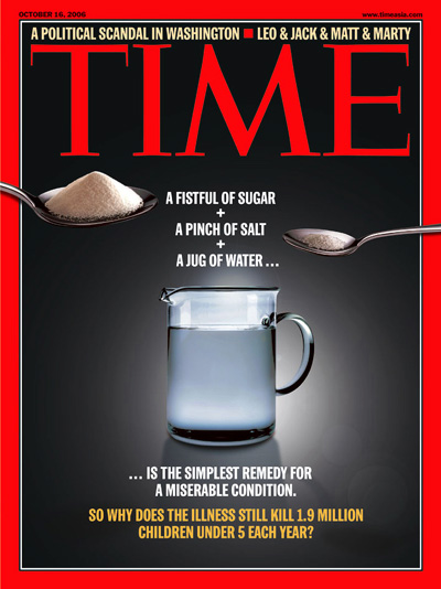 A photo showing a spoon of sugar, a spoon of salt, and a jug of water.