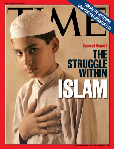 A picture of a young Muslim boy with his hand over his heart.