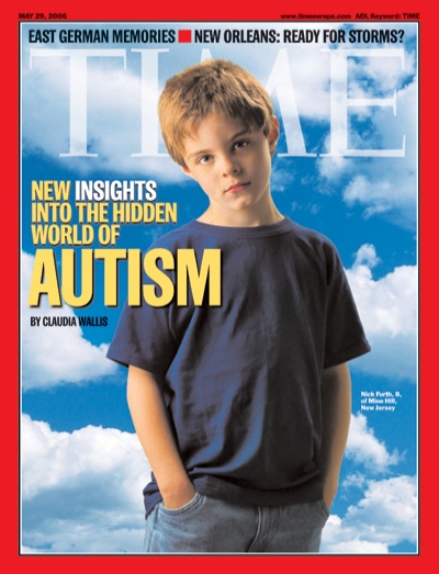 A picture of an autistic boy with a blue sky behind him.